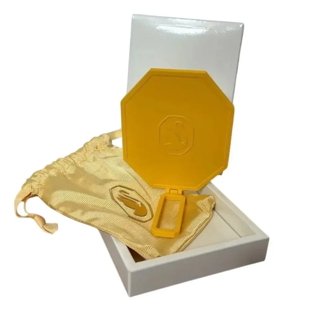 Swarovski yellow handheld mirror